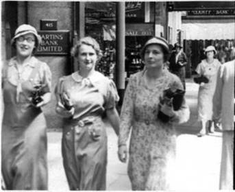 1933 Ladies walking outside branch MBA
